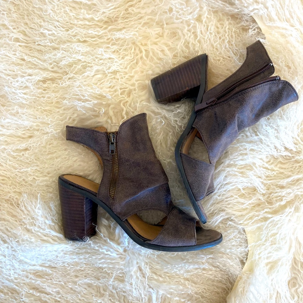 Brown faux suede open toe booties.
